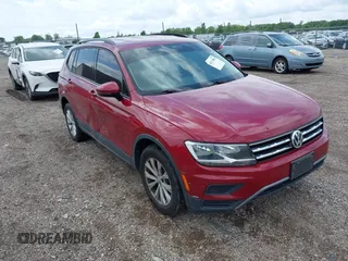 2018 Volkswagen Tiguan S with VIN 3VV1B7AX3JM045193, listed as a IAAI auction lot 42311886 with 69,049 mi miles and . Bid and sale history available at DreamBid. Image 1.