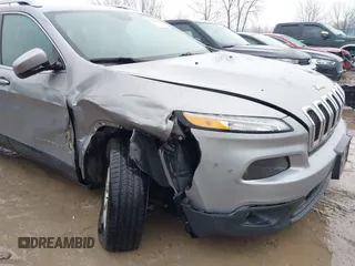 2016 Jeep Cherokee Latitude with VIN 1C4PJLCB7GW273440, listed as a IAAI auction lot 41452456 with 106,048 mi miles. Bid and sale history available at carsss.com. Image 6.