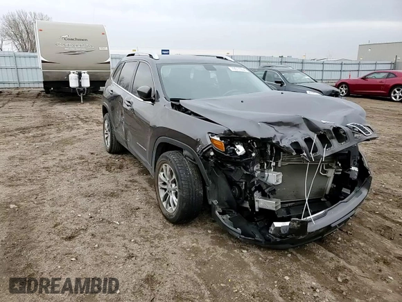 2019 Jeep Cherokee Latitude Plus z VIN 1C4PJLLB2KD296659, wystawiony jako Copart lot #79517904 z przebiegiem 99 245 mil mil oraz Szkoda całkowita • Salvage title. Historia ofert i sprzedaży dostępna na DreamBid. Obrazek 11.