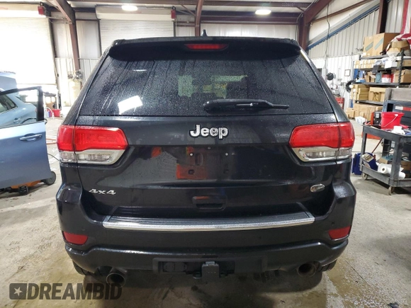 2014 Jeep Grand Cherokee Overland with VIN 1C4RJFCT9EC264594, listed as a Copart auction lot 50071695 with 124,712 mi miles and Clean Title. Bid and sale history available at DreamBid. Image 6.