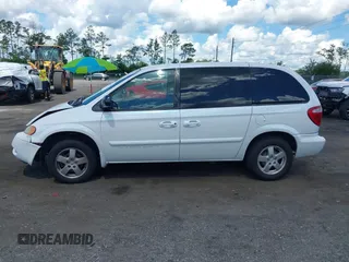 2006 Dodge Caravan SXT with VIN 1D4GP45R66B607464, listed as a IAAI auction lot 42614704 with 129,323 mi miles and . Bid and sale history available at DreamBid. Image 14.