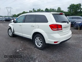 2017 Dodge Journey SXT with VIN 3C4PDDBG2HT702775, listed as a IAAI auction lot 42596303 with 130,639 mi miles and . Bid and sale history available at DreamBid. Image 3.