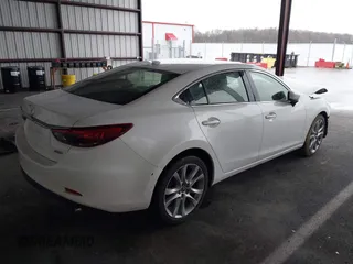 2017 Mazda Mazda6 Touring with VIN JM1GL1V51H1107726, listed as a IAAI auction lot 41875900 with 73,040 mi miles. Bid and sale history available at carsss.com. Image 4.