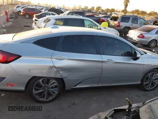 2018 Honda Clarity with VIN JHMZC5F15JC018312, listed as a IAAI auction lot 41354648 with 97,035 mi miles and . Bid and sale history available at DreamBid. Image 13.