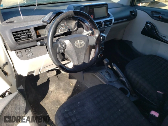 2012 Scion iQ with VIN JTNJJXB00CJ020346, listed as a Copart auction lot 80783494 with 142,577 mi miles and Salvage Title. Bid and sale history available at carsss.com. Image 8.