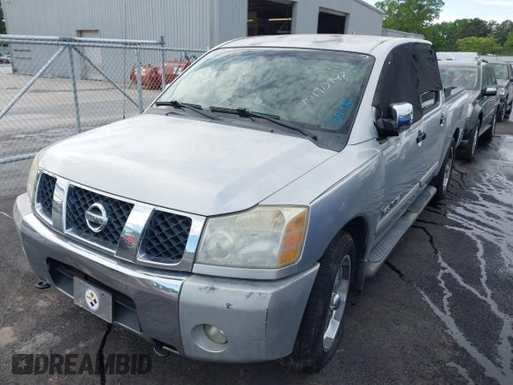 2005 Nissan Titan XE with VIN 1N6AA07A95N511746, listed as a IAAI auction lot 42190947 with 216,306 mi miles and . Bid and sale history available at DreamBid. Image 2.