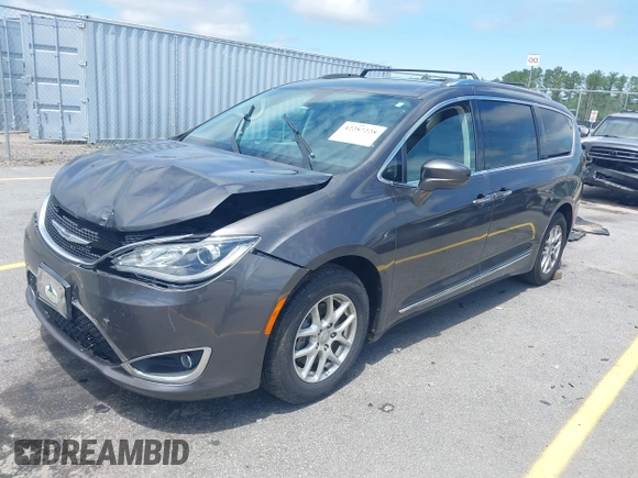 2020 Chrysler Pacifica Touring L with VIN 2C4RC1BG1LR269004, listed as a IAAI auction lot 42287228 with 71,498 mi miles and . Bid and sale history available at DreamBid. Image 17.