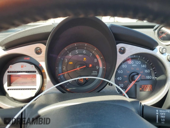 2012 Nissan 370Z Touring with VIN JN1AZ4FH3CM370910, listed as a Copart auction lot 65940005 with 23,009 mi miles and Salvage title. Bid and sale history available at DreamBid. Image 9.