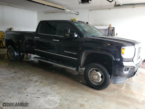 2015 GMC Sierra 3500HD available WiFi Denali with VIN 1GT424E85FF130203, listed as a Copart auction lot 84489854 with NaN miles and Salvage Title. Bid and sale history available at carsss.com. Image 4.