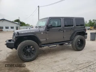 2016 Jeep Wrangler Unlimited Rubicon z VIN 1C4BJWFGXGL201040, wystawiony jako Copart lot #60543445 z przebiegiem 34 750 mil mil oraz Szkoda całkowita • Salvage title. Historia ofert i sprzedaży dostępna na DreamBid. Obrazek 1.