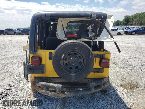 2004 Jeep Wrangler Sport with VIN 1J4FA49S84P753317, listed as a Copart auction lot 55872965 with 185,763 mi miles and Salvage title. Bid and sale history available at DreamBid. Image 6.