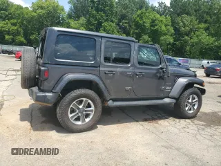 2021 Jeep Wrangler Unlimited Sahara with VIN 1C4HJXENXMW625845, listed as a Copart auction lot 64011475 with 97,505 mi miles and Salvage title. Bid and sale history available at DreamBid. Image 3.