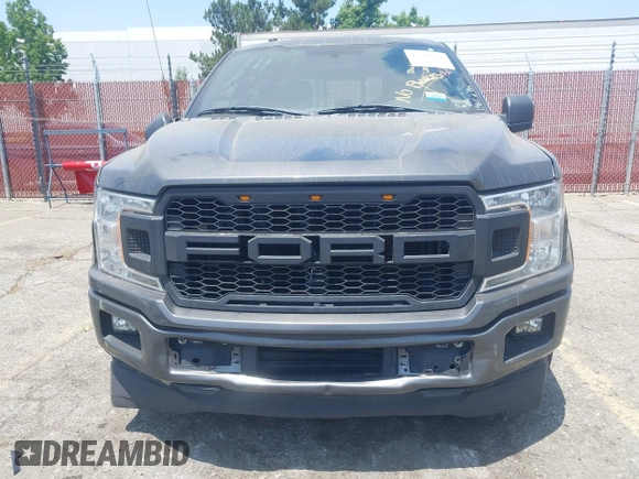 2018 Ford F-150 XL with VIN 1FTEW1CPXJKD56562, listed as a IAAI auction lot 42588371 with 137,496 mi miles and . Bid and sale history available at DreamBid. Image 6.