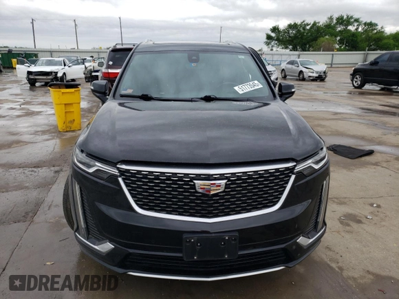 2023 Cadillac XT6 FWD Premium Luxury z VIN 1GYKPCRS5PZ101867, wystawiony jako Copart lot #51773545 z przebiegiem 31 322 mil mil oraz Szkoda całkowita • Salvage title. Historia ofert i sprzedaży dostępna na DreamBid. Obrazek 5.