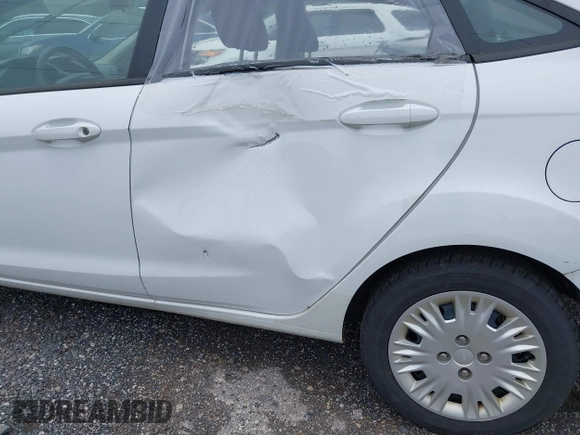 2014 Ford Fiesta S with VIN 3FADP4AJ1EM236338, listed as a IAAI auction lot 42610717 with 136,248 mi miles and . Bid and sale history available at DreamBid. Image 6.