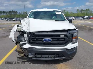 2023 Ford F-150 XL with VIN 1FTFX1E85PKF31252, listed as a IAAI auction lot 41948661 with 18,076 mi miles and . Bid and sale history available at DreamBid. Image 12.