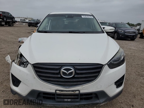 2016 Mazda CX-5 Touring with VIN JM3KE2CY0G0608044, listed as a Copart auction lot 51810175 with 162,232 mi miles and Salvage Title. Bid and sale history available at carsss.com. Image 5.