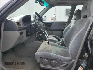 2001 Subaru Forester S w/Premium Pkg with VIN JF1SF656X1H725718, listed as a Copart auction lot 51517935 with 153,875 mi miles and Salvage Title. Bid and sale history available at carsss.com. Image 7.