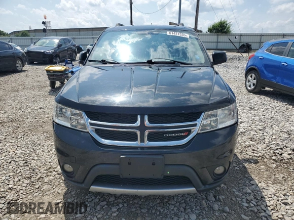 2013 Dodge Journey SXT with VIN 3C4PDDBG0DT532765, listed as a Copart auction lot 61481335 with 193,066 mi miles and Salvage title. Bid and sale history available at DreamBid. Image 5.