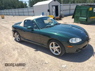 2003 Mazda MX-5 Miata Cloth with VIN JM1NB353630312509, listed as a Copart auction lot 54533135 with 71,269 mi miles and Clean Title. Bid and sale history available at DreamBid. Image 4.