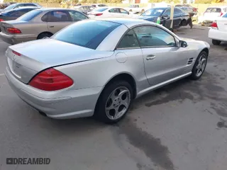 2005 Mercedes-Benz SL-Class 5.0L with VIN WDBSK75F25F100967, listed as a IAAI auction lot 41562622 with 76,498 mi miles. Bid and sale history available at carsss.com. Image 4.