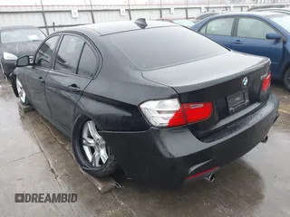 2014 BMW 3 Series 335i with VIN WBA3A9C57EF477662, listed as a IAAI auction lot 41435544 with 129,543 mi miles. Bid and sale history available at carsss.com. Image 3.