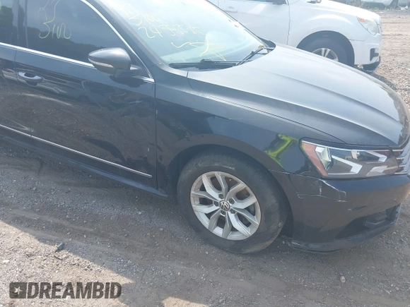 2016 Volkswagen Passat S with VIN 1VWAT7A30GC058676, listed as a IAAI auction lot 39978574 with Not provided miles and . Bid and sale history available at DreamBid. Image 6.