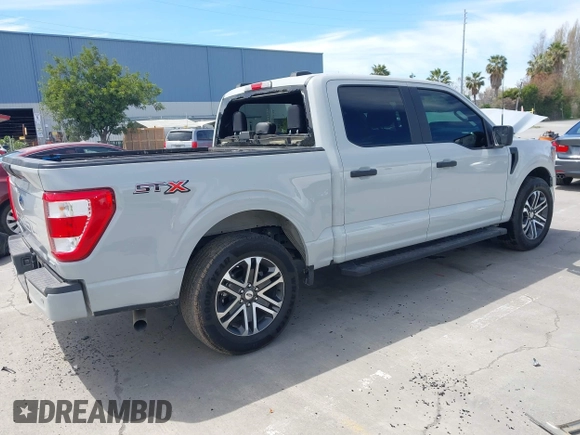 2023 Ford F-150 XL with VIN 1FTEW1CP2PKE60004, listed as a IAAI auction lot 41982176 with 17,900 mi miles and . Bid and sale history available at DreamBid. Image 4.