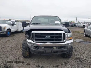 2003 Ford F-350 XL z VIN 1FTSW31PX3EB33845, wystawiony jako IAAI lot #42138067 z przebiegiem 397 266 mil mil oraz . Historia ofert i sprzedaży dostępna na DreamBid. Obrazek 12.