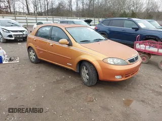 2005 Suzuki Reno z VIN KL5JJ66Z85K160610, wystawiony jako IAAI lot #41526883 z przebiegiem Nie podano mil oraz . Historia ofert i sprzedaży dostępna na DreamBid. Obrazek 1.