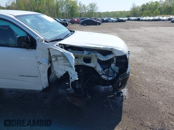 2022 Chevrolet Colorado 4WD Z71 with VIN 1GCGTDEN2N1266879, listed as a IAAI auction lot 42036942 with 98,647 mi miles and . Bid and sale history available at DreamBid. Image 6.