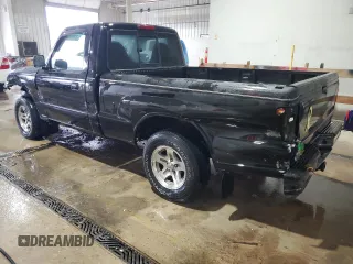 2002 Mazda B-Series 2WD Truck SX with VIN 4F4YR12D02TM00986, listed as a Copart auction lot 88323825 with 124,186 mi miles and Salvage Title. Bid and sale history available at carsss.com. Image 2.