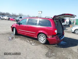 2013 Chrysler Town & Country Touring z VIN 2C4RC1BG7DR777172, wystawiony jako IAAI lot #41780881 z przebiegiem 196 768 mil mil oraz . Historia ofert i sprzedaży dostępna na DreamBid. Obrazek 3.