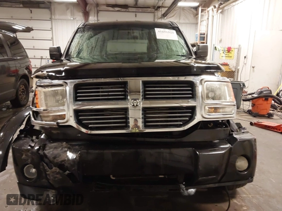 2007 Dodge Nitro SXT with VIN 1D8GU28K67W663621, listed as a IAAI auction lot 41691529 with 211,556 mi miles. Bid and sale history available at carsss.com. Image 13.
