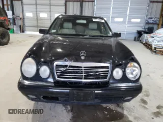 1998 Mercedes-Benz E-Class with VIN WDBJF65FXWA648112, listed as a Copart auction lot 47074665 with 0 mi miles and Salvage Title. Bid and sale history available at carsss.com. Image 5.