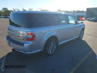 2013 Ford Flex Limited with VIN 2FMHK6D83DBD02351, listed as a IAAI auction lot 40977231 with 194,651 mi miles. Bid and sale history available at carsss.com. Image 4.