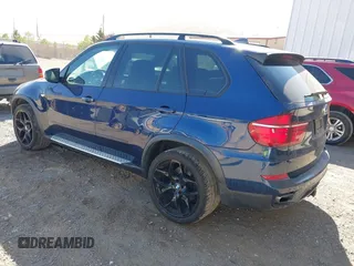 2012 BMW X5 50i with VIN 5UXZV8C57CL423223, listed as a IAAI auction lot 42606594 with 94,695 mi miles and . Bid and sale history available at DreamBid. Image 3.