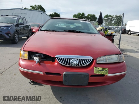1997 Mercury Cougar z VIN 1MELM62W6VH618680, wystawiony jako Copart lot #53379985 z przebiegiem 123 474 mil mil oraz Szkody całkowita. Historia ofert i sprzedaży dostępna na DreamBid. Obrazek 5.
