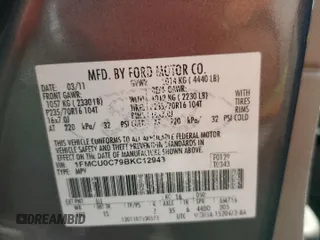 2011 Ford Escape XLS with VIN 1FMCU0C79BKC12943, listed as a Copart auction lot 64702085 with 151,117 mi miles and Clean title. Bid and sale history available at DreamBid. Image 13.