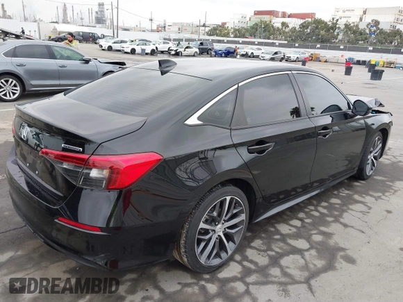 2022 Honda Civic Sedan Touring with VIN 2HGFE1F91NH308547, listed as a IAAI auction lot 41882514 with 39,249 mi miles. Bid and sale history available at carsss.com. Image 4.