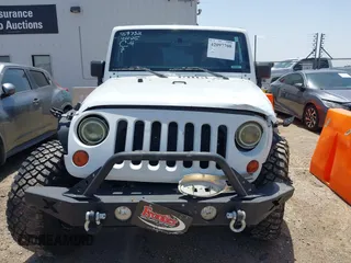 2013 Jeep Wrangler Unlimited Sport with VIN 1C4BJWDGXDL694054, listed as a IAAI auction lot 42097708 with 130,360 mi miles and . Bid and sale history available at DreamBid. Image 13.