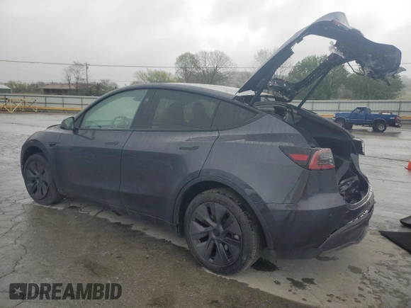 2024 Tesla Model Y with VIN 7SAYGDED1RA321691, listed as a Copart auction lot 52153945 with 7,544 mi miles and Salvage Title. Bid and sale history available at DreamBid. Image 2.