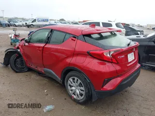 2020 Toyota C-HR LE with VIN JTNKHMBX4L1067648, listed as a IAAI auction lot 41556302 with 64,698 mi miles. Bid and sale history available at carsss.com. Image 3.