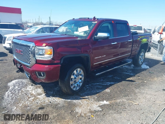 2016 GMC Sierra 2500HD Denali z VIN 1GT12UE87GF287056, wystawiony jako IAAI lot #41753772 z przebiegiem 284 546 mil mil oraz . Historia ofert i sprzedaży dostępna na DreamBid. Obrazek 2.