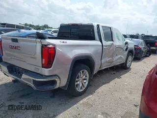 2020 GMC Sierra 1500 SLT z VIN 3GTU9DED9LG299417, wystawiony jako IAAI lot #42168562 z przebiegiem Nie podano mil oraz . Historia ofert i sprzedaży dostępna na DreamBid. Obrazek 4.