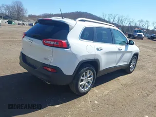 2015 Jeep Cherokee Latitude with VIN 1C4PJMCS8FW624375, listed as a IAAI auction lot 41848679 with 148,130 mi miles and . Bid and sale history available at DreamBid. Image 4.