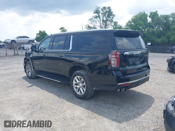2023 Chevrolet Suburban Premier with VIN 1GNSKFKDXPR385697, listed as a IAAI auction lot 42601771 with 75,487 mi miles and . Bid and sale history available at DreamBid. Image 3.