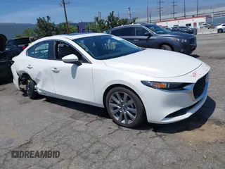 2024 Mazda 3 S Preferred with VIN 3MZBPACMXRM420901, listed as a IAAI auction lot 42101021 with 6,443 mi miles and . Bid and sale history available at DreamBid. Image 1.