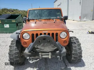 2010 Jeep Wrangler Rubicon with VIN 1J4BA6D12AL186887, listed as a Copart auction lot 57902545 with Not provided miles and Salvage title. Bid and sale history available at DreamBid. Image 5.