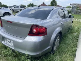 2014 Dodge Avenger SE with VIN 1C3CDZAB8EN149812, listed as a IAAI auction lot 42092082 with 126,244 mi miles and . Bid and sale history available at DreamBid. Image 4.